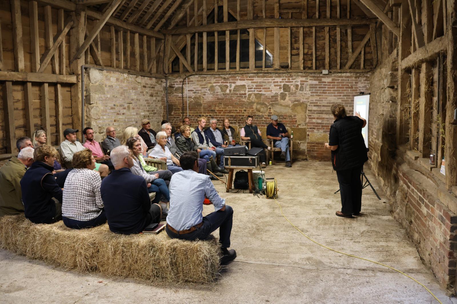 Speaker presenting to the Beef and Flock Club in the barn at Black Ven Farm